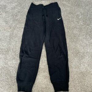 Nike sweatpants with white swoosh